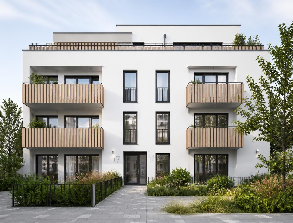 Fertiggestelltes modernes Mehrfamilienhaus mit hellem Putz und Holzbalkonen